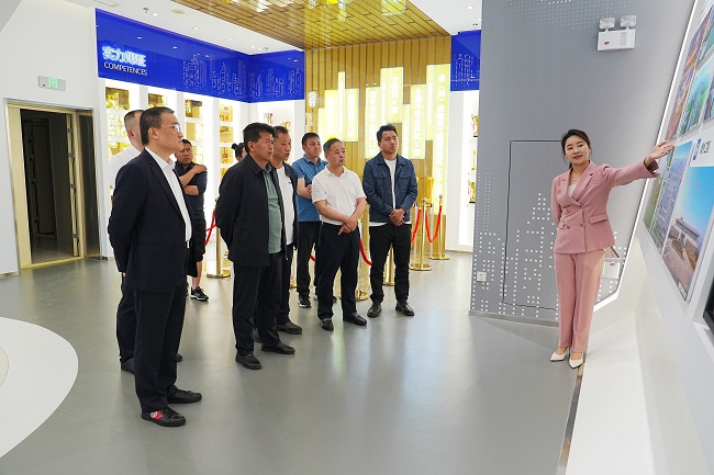 西藏措美县党政代表团来建设投资集团考察交流